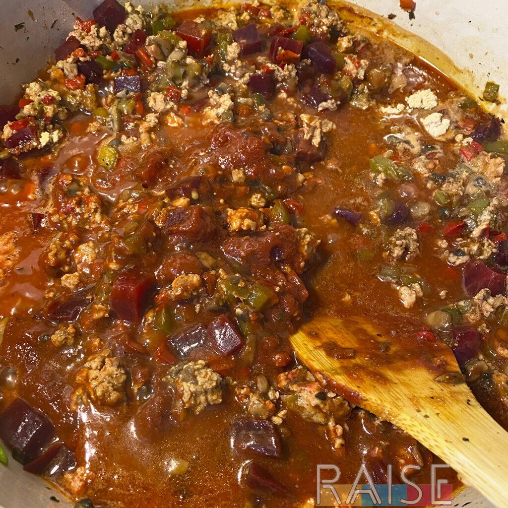 Gluten Free Chili Cooking in Dutch Oven by The Allergy Chef