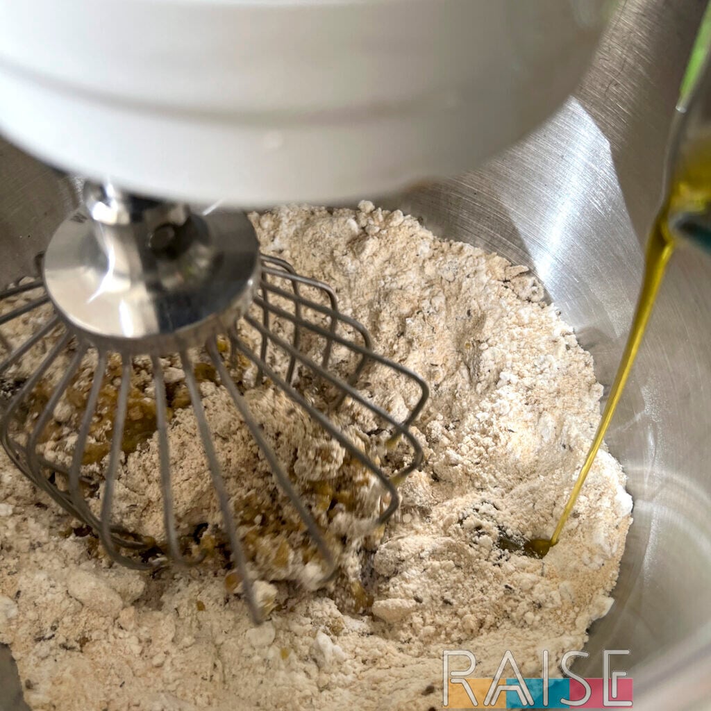 Adding Olive Oil to Dry Ingredients by The Allergy Chef