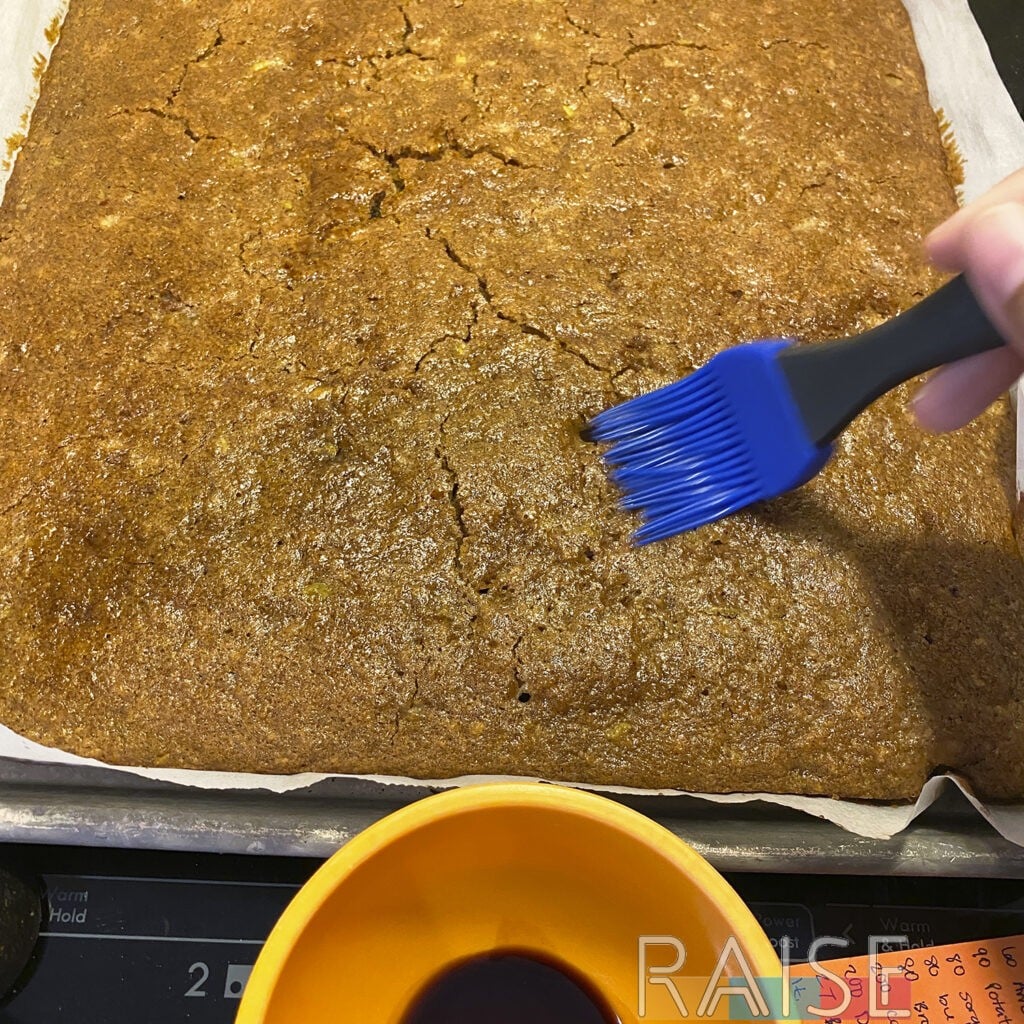 Brushing Maple Extract on the Vegan Apple Cake Recipe by The Allergy Chef
