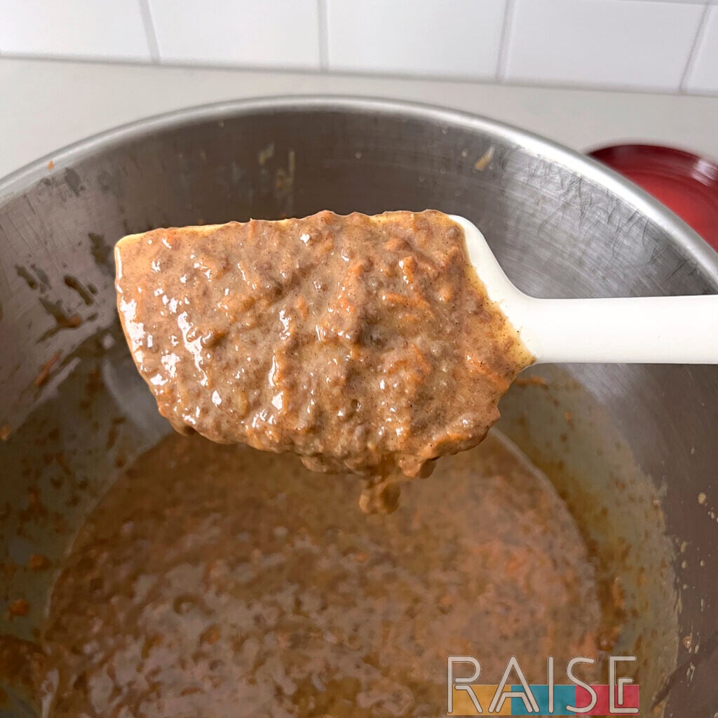 Closeup of Vegan Gluten Free Carrot Cake Batter on Spatula by The Allergy Chef