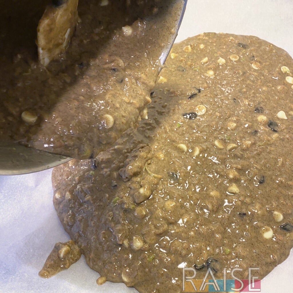 Pouring Vegan Apple Cake Batter on to Baking Tray by The Allergy Chef